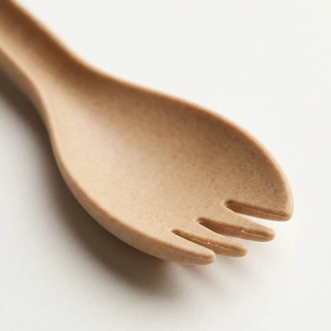CompostEase | Spork close-up showing spoon bowl with short rounded tines, highlighting smooth plant-fiber texture and compostable design.