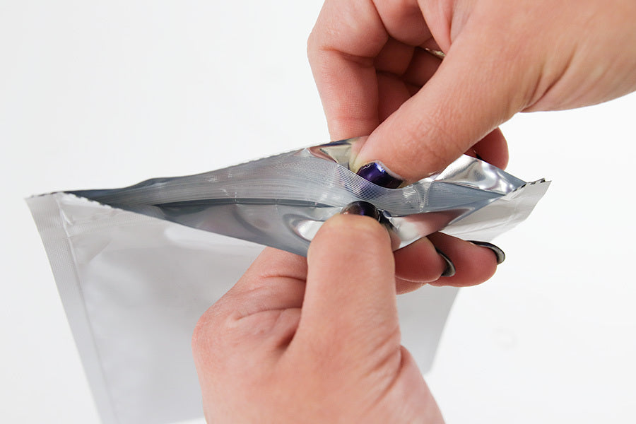 A secure, child-resistant cannabis container with a tamper-evident seal.